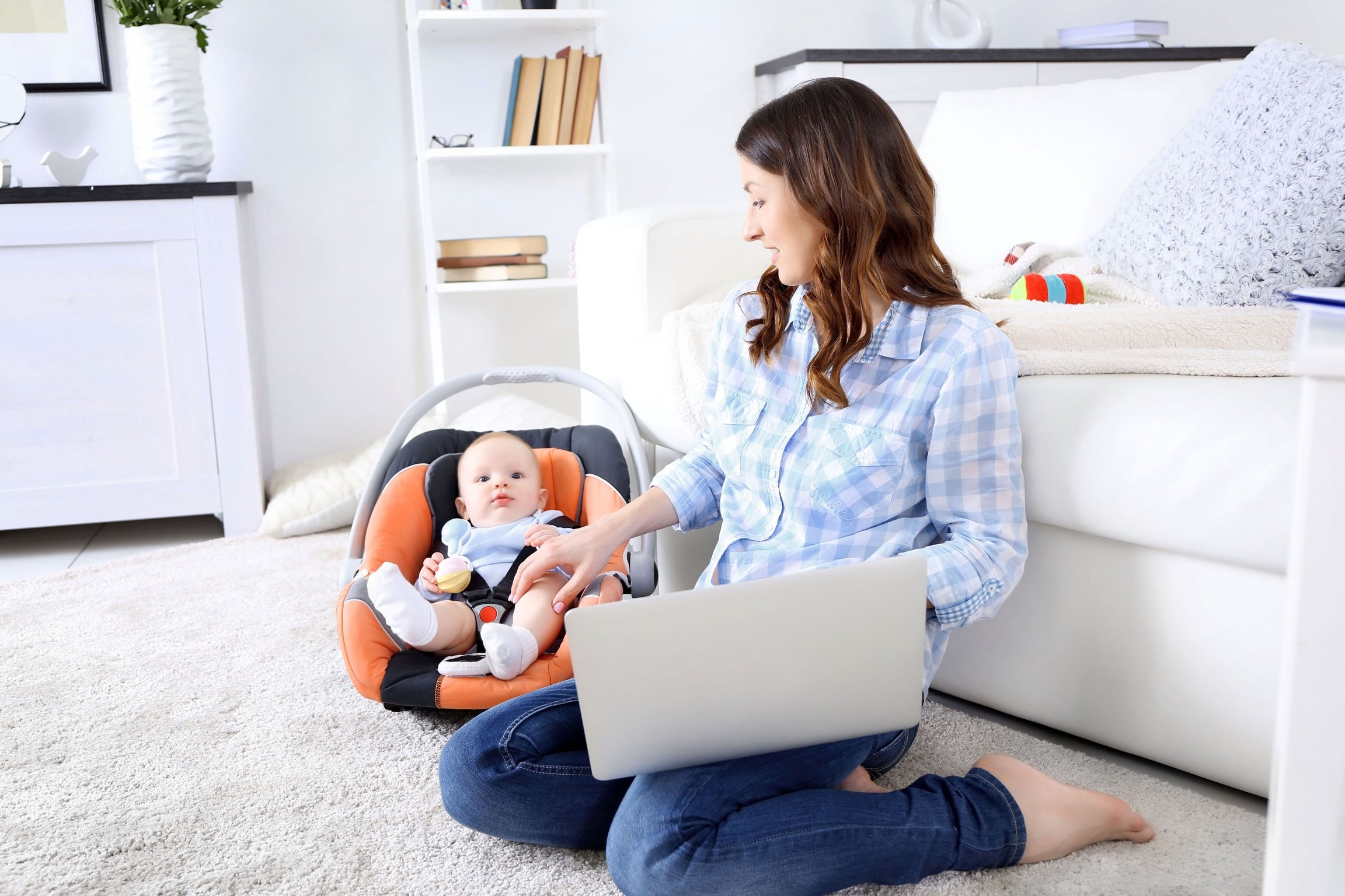 Mother Multitasking Work and Caring for Child 